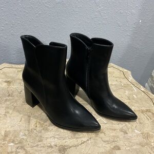 Sleek Black Heeled Boots
